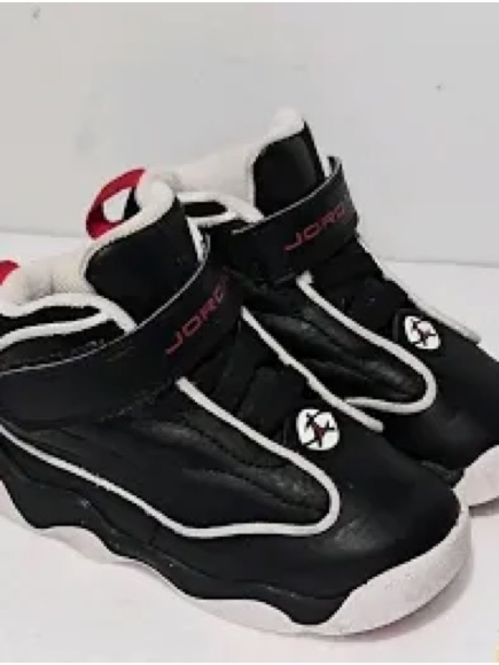 Jordan Kids Black and Red High-Top Sneakers with White Trim size 6C